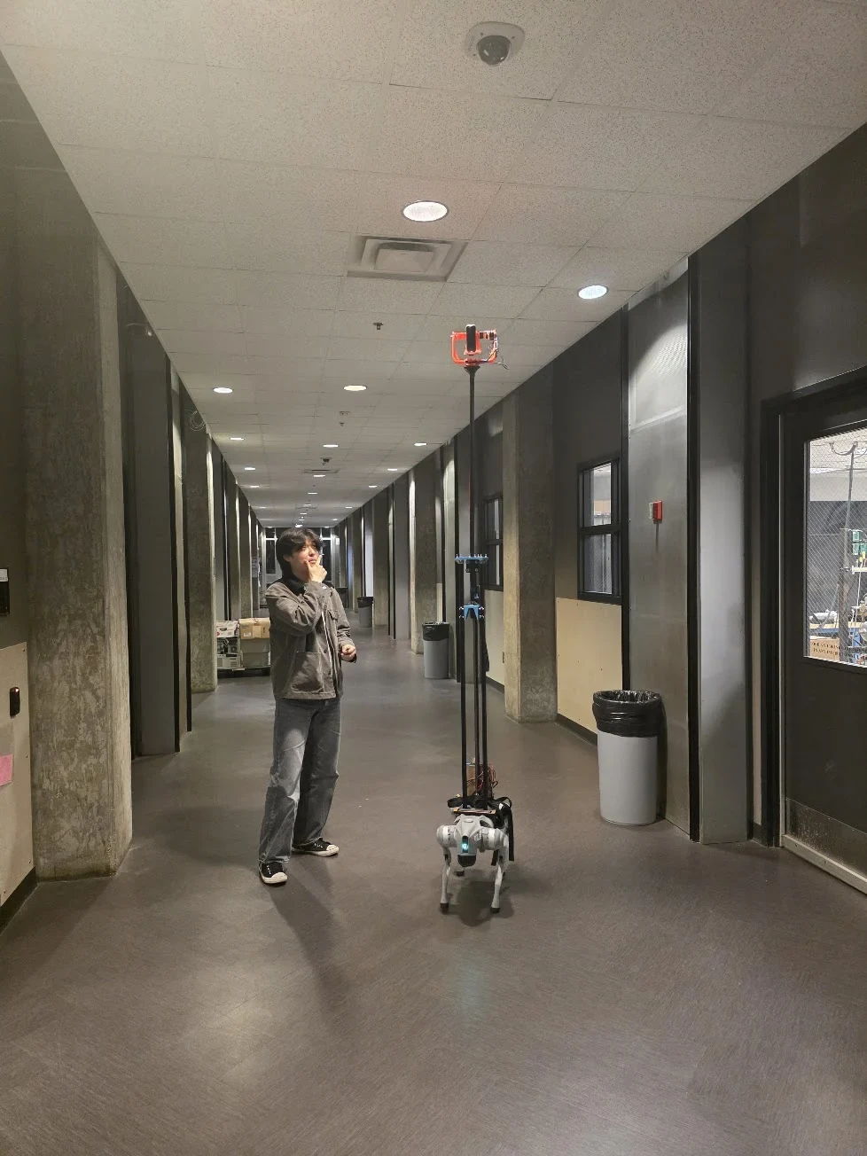 Justin Park beside the completed team camera payload mounted on a Unitree Go2 Pro
