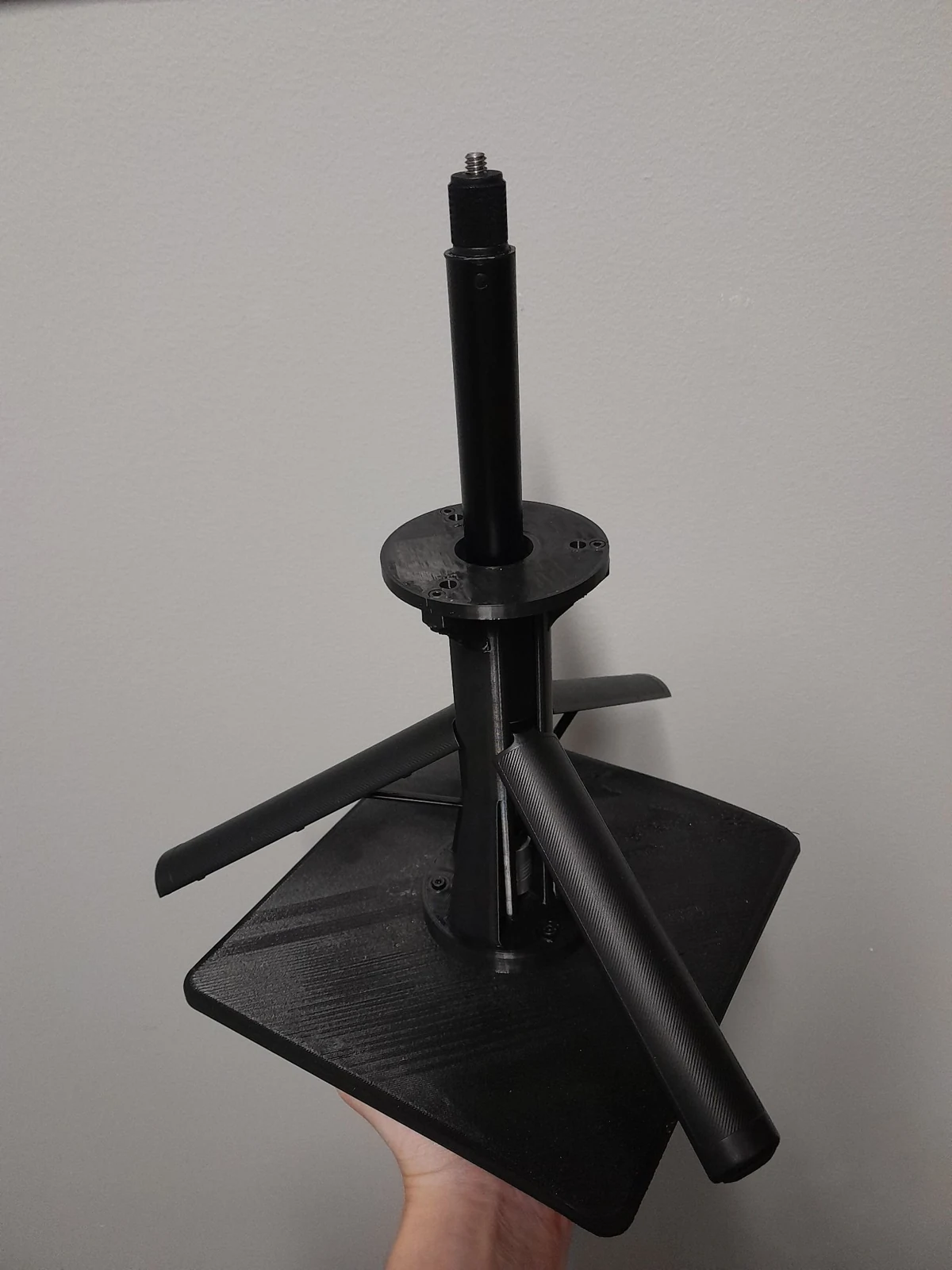 Early printed mounting interface held for inspection